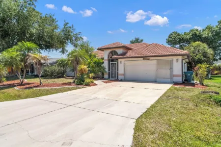 Florida Fun Home with fully fenced, pool backyard and game room