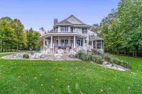 Lakeview home with private pickleball court, firepits, fireplace, & full kitchen