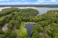Lovely lakeside condo with pool, tennis court, fireplace, & washer/dryer Hotels in Village of Four Seasons