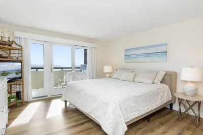 Community Pool and Lush Surroundings - Charming Oceanfront Retreat Hotels near Pine Knoll Shores