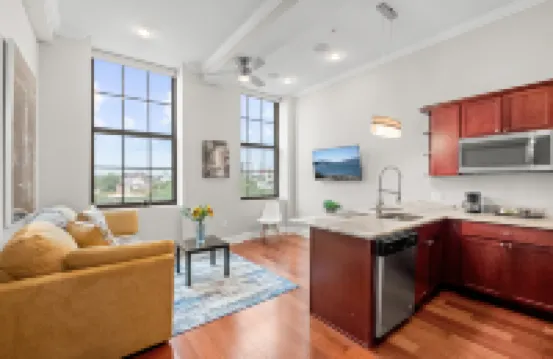 Rooftop Pool and Modern Amenities - Stylish Urban Escape