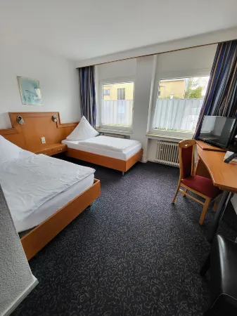 Hotel Haus am Rieth Отели в г. Неттеталь