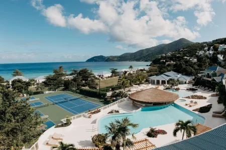 Long Bay Beach Resort Отели в г. Belle Vue