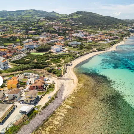 Large seaside apartment with patio in Lu Bagnu