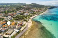Large seaside apartment with patio in Lu Bagnu - 3-Star