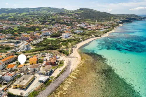 Large seaside apartment with patio in Lu Bagnu Hotels in Lu Bagnu