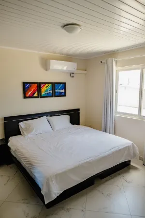 Gorgeous 2-Bedroom Apartment 2 km from Eagle Beach Отели рядом с достопримечательностью «Малмок Бич»