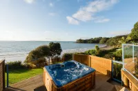 By the Bay Beachfront Apartments Hotels in Taipa