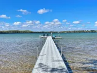 Lakefront Oasis w Beach + Dock for Your Boat Hotels in Grayling Township