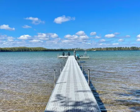 Lakefront Oasis w Beach + Dock for Your Boat Hotels in Grayling Township