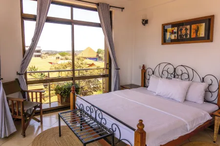 Lilac Elevate Inn Отели рядом с достопримечательностью «Lake Duluti»