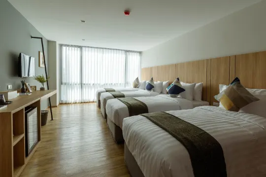 แฟมิลี่แกรนด์ดีลักซ์ (เตียงเดี่ยว 4 เตียง)