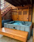 4-bedroom cabin in peaceful Apple Valley with AC, WiFi. Enjoy nature retreat.