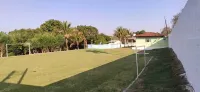 Farm with swimming pool, kiosk, barbecue, soccer field, play ground.