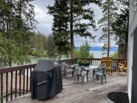 Flathead Lake home W/ private beach, dock, and hot tub