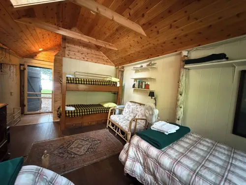 Torch Lake Exceptional Lakefront Cottage and Guest House - with Sandy Beach