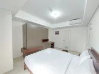 Good Place and Homey 2BR at Podomoro City Deli Medan Apartment By Travelio - Апартаменты