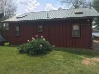 Indian Lakes Cabin with private beach and dock lake side