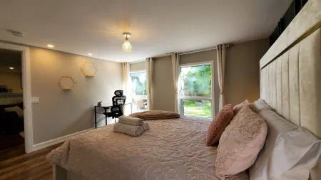 Modern renovated walkout bsmt with new Hot tub