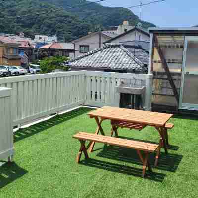 Relax on the spacious balcony with BBQ and garden Hotel Exterior