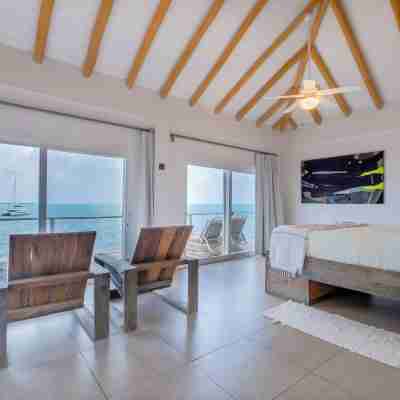Thatch Caye Resort a Muy'Ono Resort Rooms