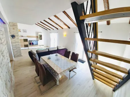 Modern Attic Apartment Отели в г. Rab