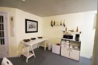 Gandhi: Very Large Room Decorated in Indian Style, Office Space and Sofa