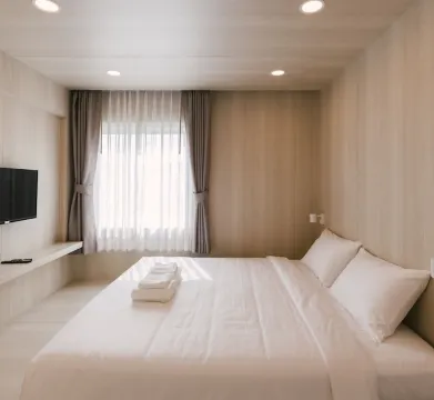 ห้องดีลักซ์ เตียงใหญ่ 1 เตียง