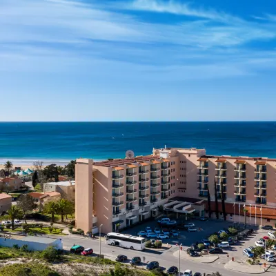 Pestana D. João II Beach & Golf Resort Hotels near Praia dos Tres Irmaos