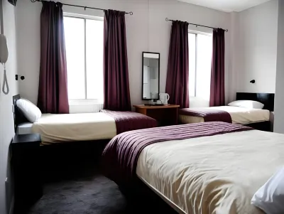Arriva Hotel Hotels near Regent Square Gardens