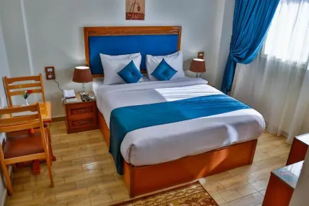 The Palm Hotel Отели в г. Kafr Abu Tabl