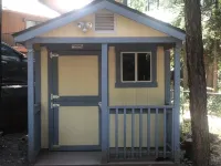 Paradise Cabin in the Pines<br>Comfortable Patios and porch swing <br>Watch kids play