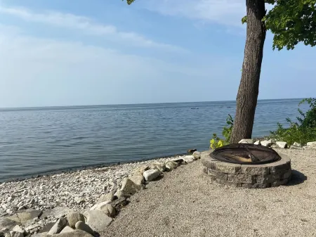 Relax on the Shores of Green Bay in Your Beautiful, Private, Two Bedroom Home