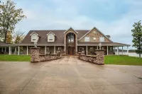 "LAKE HOUSE" On 7 Acres Of Douglas Lake With A Private Boat Ramp & Private Dock!