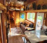 Near Pictured Rocks and trails, on the AuTrain River, has private hot tub