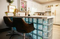 Vintage kitsch 70s/80s themed house with indoor pool and backyard creek