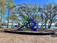 Renovated 1970’s retro camper on Bayou Grande in Pensacola with walking trail.