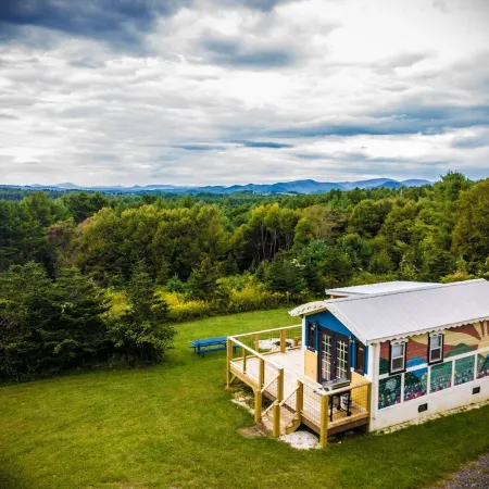 Tiny, charming mountaintop cottage with large firepit, deck and amazing views