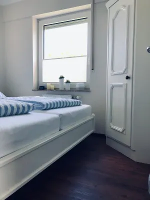 Ferienwohnung im Haus Norderney Nr.1 Dornumersiel Touristinformation Dornumersiel附近的飯店