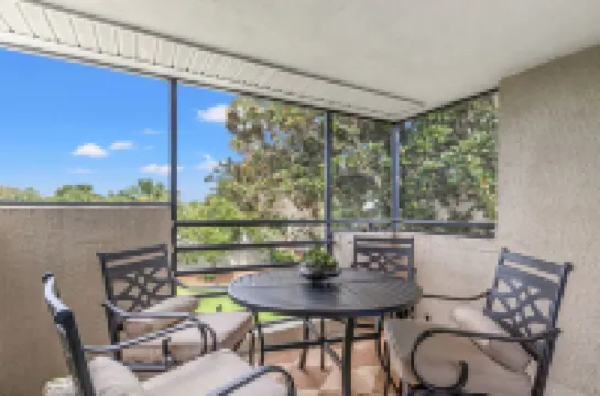 Light, Airy Luxury Condo Steps from Private Beach