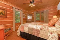 A Laurel Haven, with big porches and a log cabin feel. Fireplace.