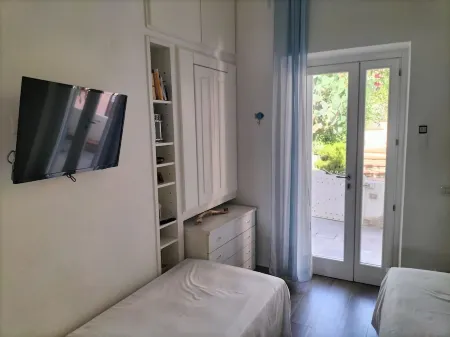 Apartment with exclusive garden and seaview in Pomonte, 50 meters from the sea