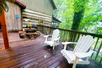 Robin's Nest is an authentic log cabin built with hand-hewn logs from the 1800's