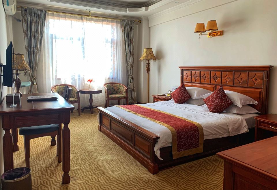 Asia & Africa Hôtel의 깔끔한 객실 내부 사진