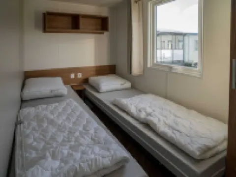 해변과 수영장 근처의 오스트카펠레의 샬레 오스트카펠 호텔