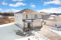 Inviting Living Area and Fully Stocked Kitchen - Spacious Serenity