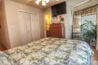 Riverfront Oasis with Two Balconies and Pools - Stunning Retreat