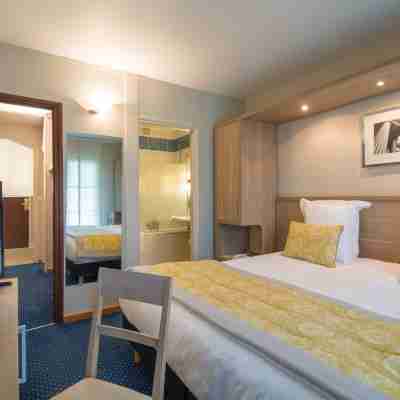 Logis Hôtel Lensotel Rooms