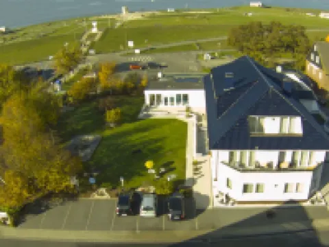 โรงแรมอัมฟรีเซินสแตรนด์ โรงแรมในTossens