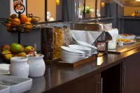 Orange Hotel und Apartments - Aamiainen